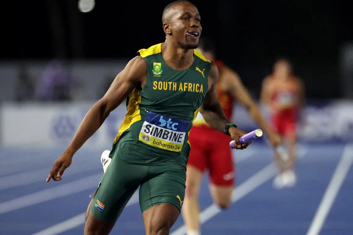 FILE PHOTO: Athletics - World Athletics Relays - Thomas A. Robinson National Stadium, Nassau, Bahamas - May 5, 2024 South Africa's Akani Simbine crosses the line to win the 4X100 metres relay men heat 3 REUTERS/Dante Carrer/File Photo