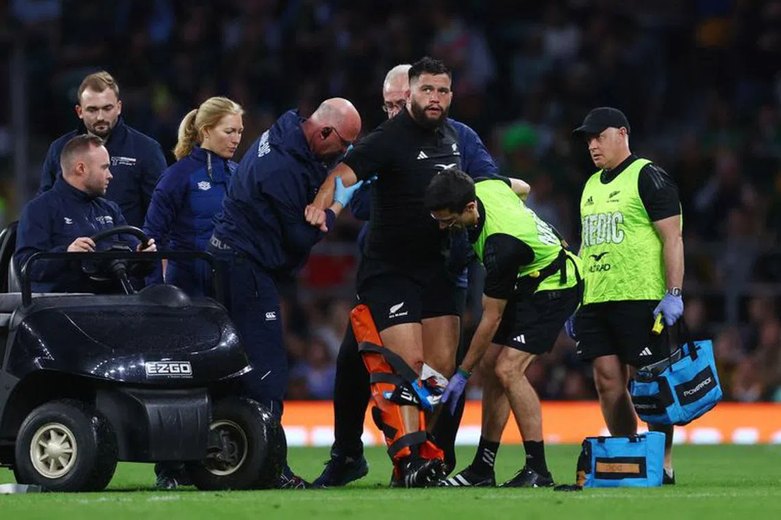 FILE PHOTO: Rugby Union - New Zealand v South Africa - World Cup warm-up - Twickenham Stadium, London, Britain - August 25, 2023 New Zealand's Tyrel Lomax is helped onto a cart after sustaining an injury Action Images via Reuters/Matthew Childs