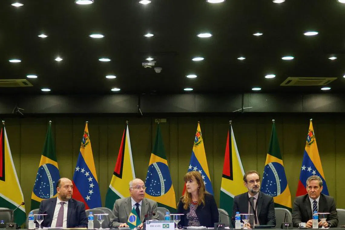 Brazil's Foreign Minister Mauro Vieira, Venezuela's Foreign Minister Yvan Gil and Guyana's Foreign Minister Hugh Todd attend a meeting between representatives of the governments of Venezuela and Guyana to discuss the crisis surrounding the territory of Essequibo, disputed by the two countries at the Itamaraty Palace in Brasilia, Brazil January 25, 2024. REUTERS/Adriano Machado