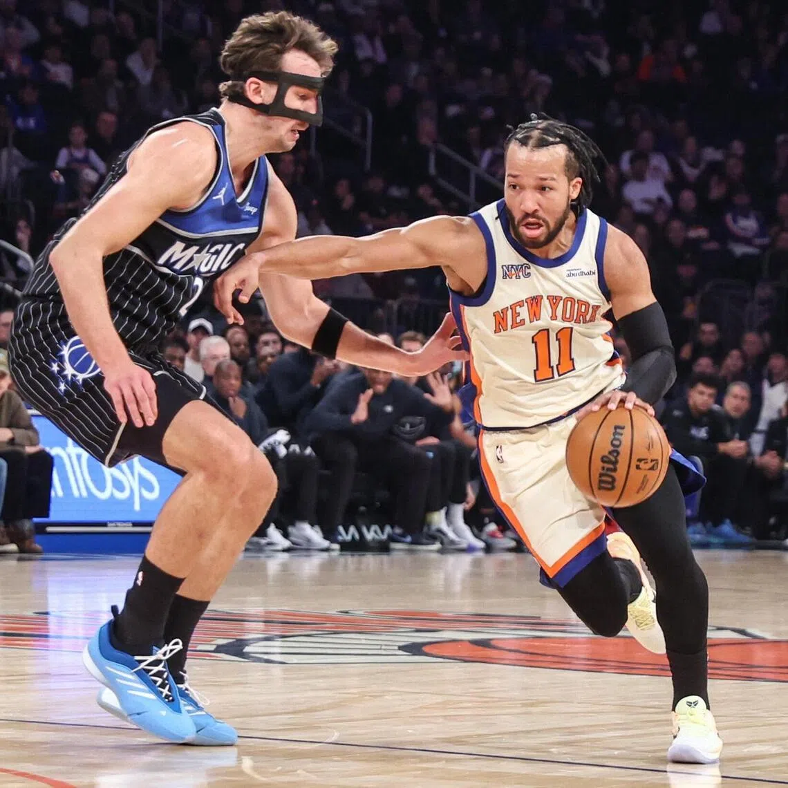 New York Knicks guard Jalen Brunson looks to drive past Orlando Magic forward Franz Wagner in the first quarter at Madison Square Garden.