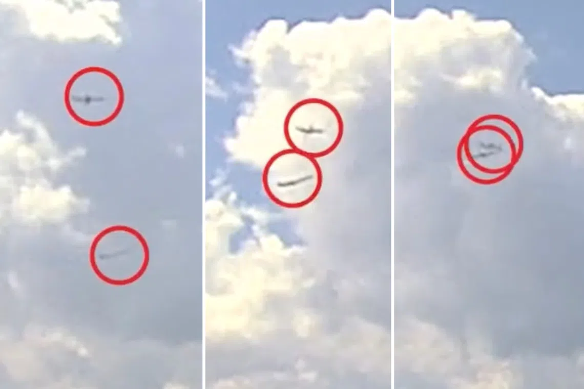 A video from a police dash camera shows two planes appearing to almost slam into each other.