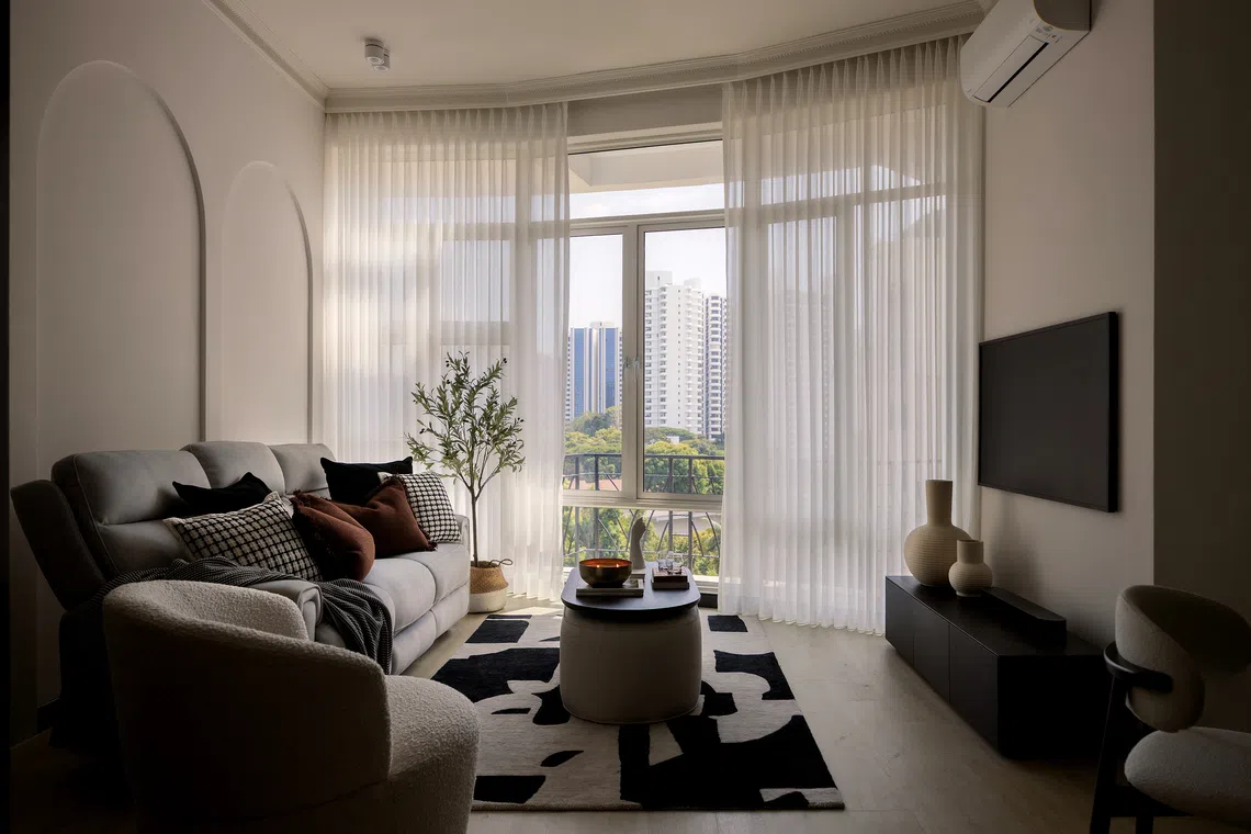 As the owners of this Tanglin three-bedder love to entertain guests, a sunny, spacious living area was essential.