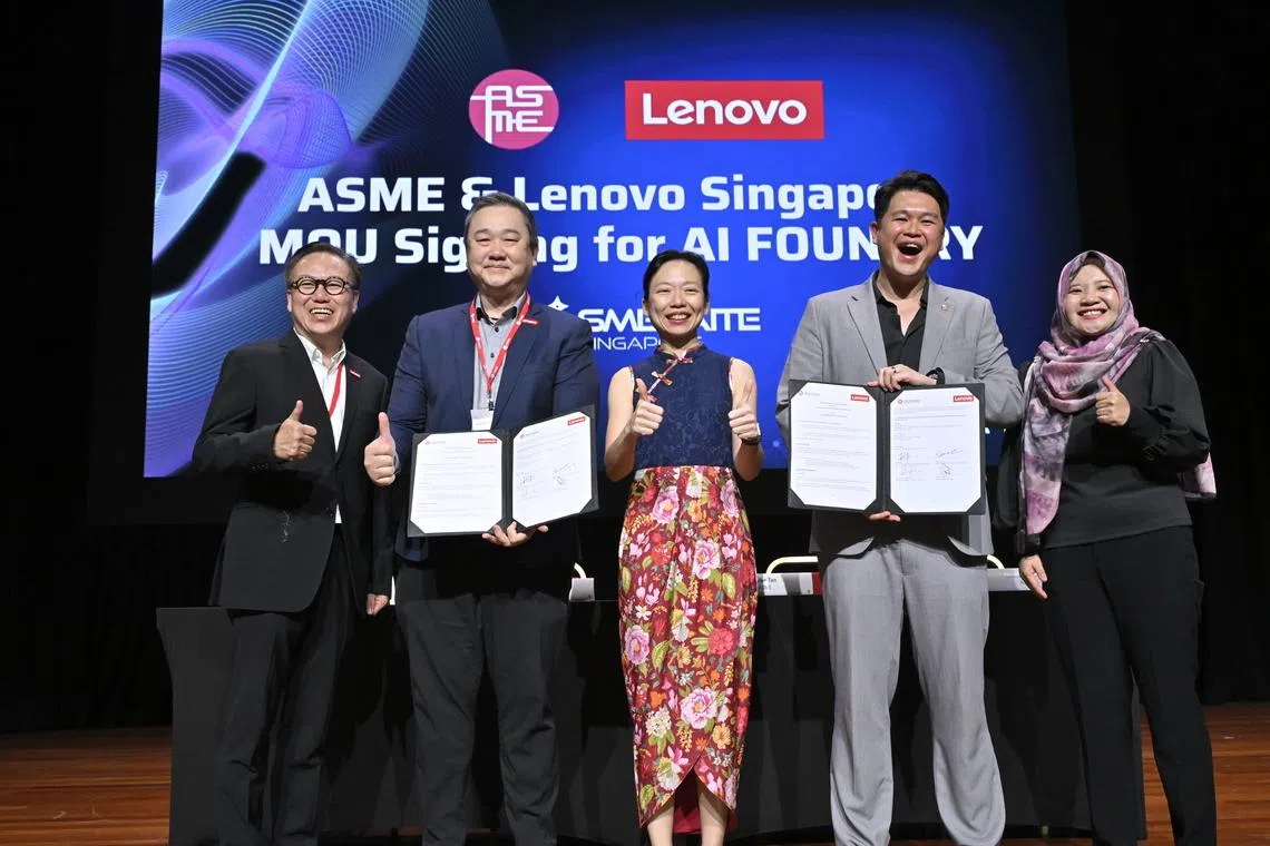 Minister of State for Digital Development and Information Jasmin Lau witnessing the signing of the MOU between ASME and Lenovo on Jan 22.