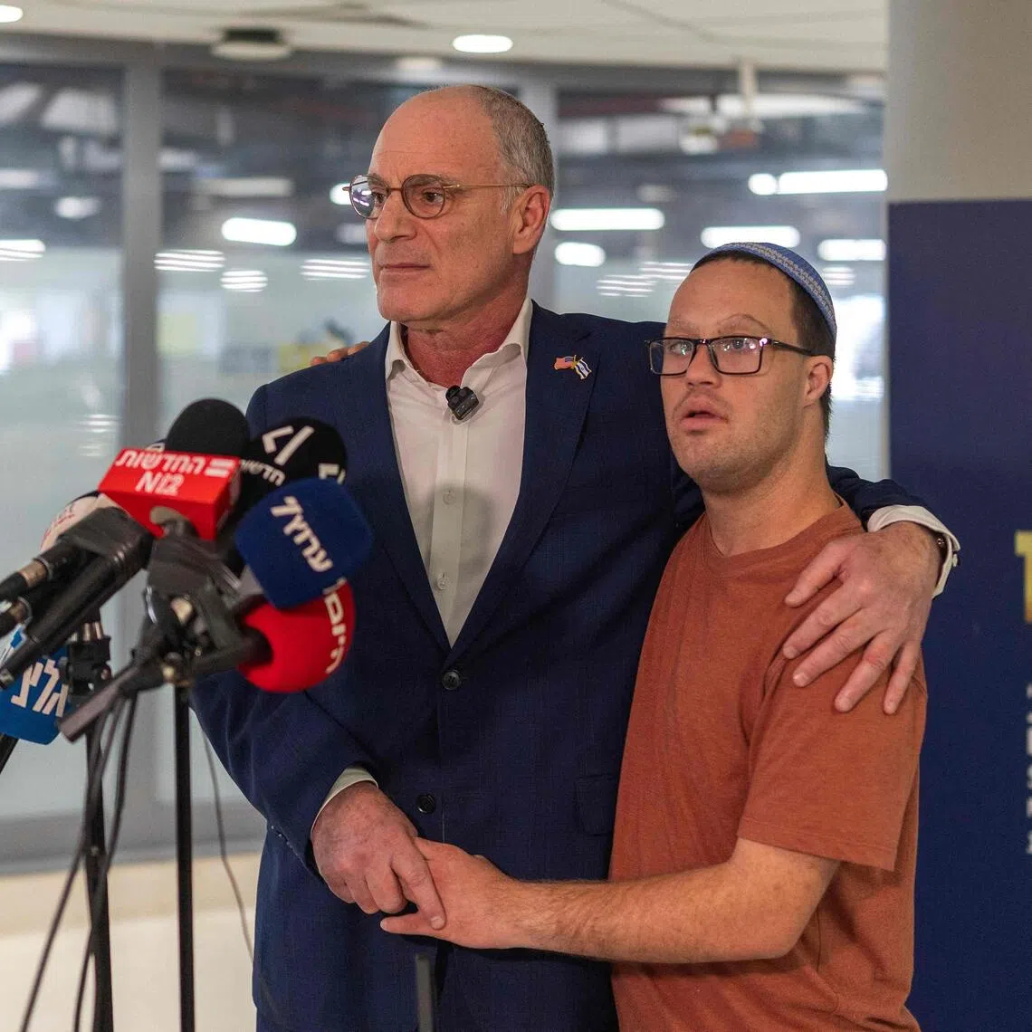 Israeli ambassador to the US, Yechiel Leiter (left) stands along with one of his sons, Noam Leiter, at the Shaarai Tzedek hospital in Jerusalem. His son Neria Leiter underwent a “complex brain surgery” overnight that lasted several hours.