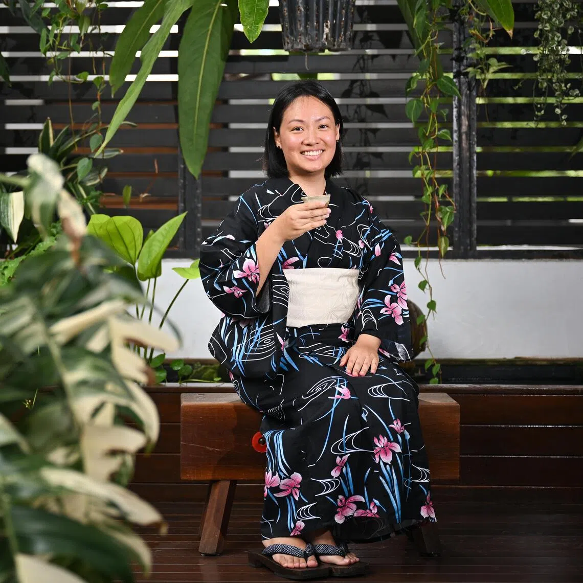 ST20250808-202532800465-Lim Yaohui-Venessa Lee-vlpivot/
Ms Heidi Tan, 36, tour guide from ​Kitabi Travel, holding a tea cup, at home on Aug 8, 2025.
People pivoting to new careers in mid-life and older: Heidi Tan, owner of FLOR Patisserie which closed down recently due to high rental, who has pivoted to being a tour guide for Japan, where she hosts curated tours including tea tours.
(ST PHOTO: LIM YAOHUI)