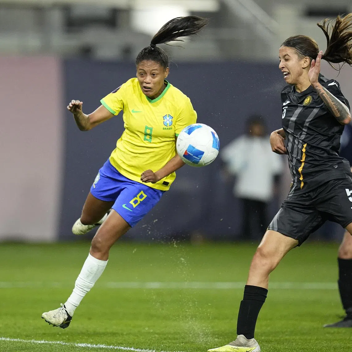 Feb 21, 2024; San Diego, California, USA;  Brazil forward Ary Borges (8) battles for the ball against Puerto Rico defender Madison Cox (5) during the first half of the 2024 Concacaf W Gold Cup group B stage match at Snapdragon Stadium. Mandatory Credit: Ray Acevedo-USA TODAY Sports