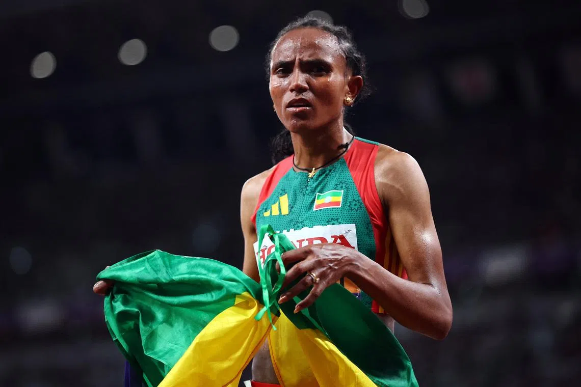 World Athletics Championships Tokyo 2025 - Women's 10,000m Final - Japan National Stadium, Tokyo, Japan - September 13, 2025 Bronze medallist Ethiopia's Gudaf Tsegay reacts after the Women's 10,000m Final REUTERS/Sarah Meyssonnier
