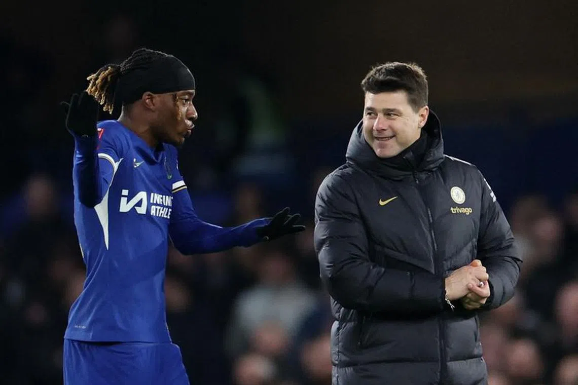 Soccer Football - FA Cup - Third Round - Chelsea v Preston North End - Stamford Bridge, London, Britain - January 6, 2024 Chelsea manager Mauricio Pochettino talks to Noni Madueke after the match REUTERS/Isabel Infantes/File Photo
