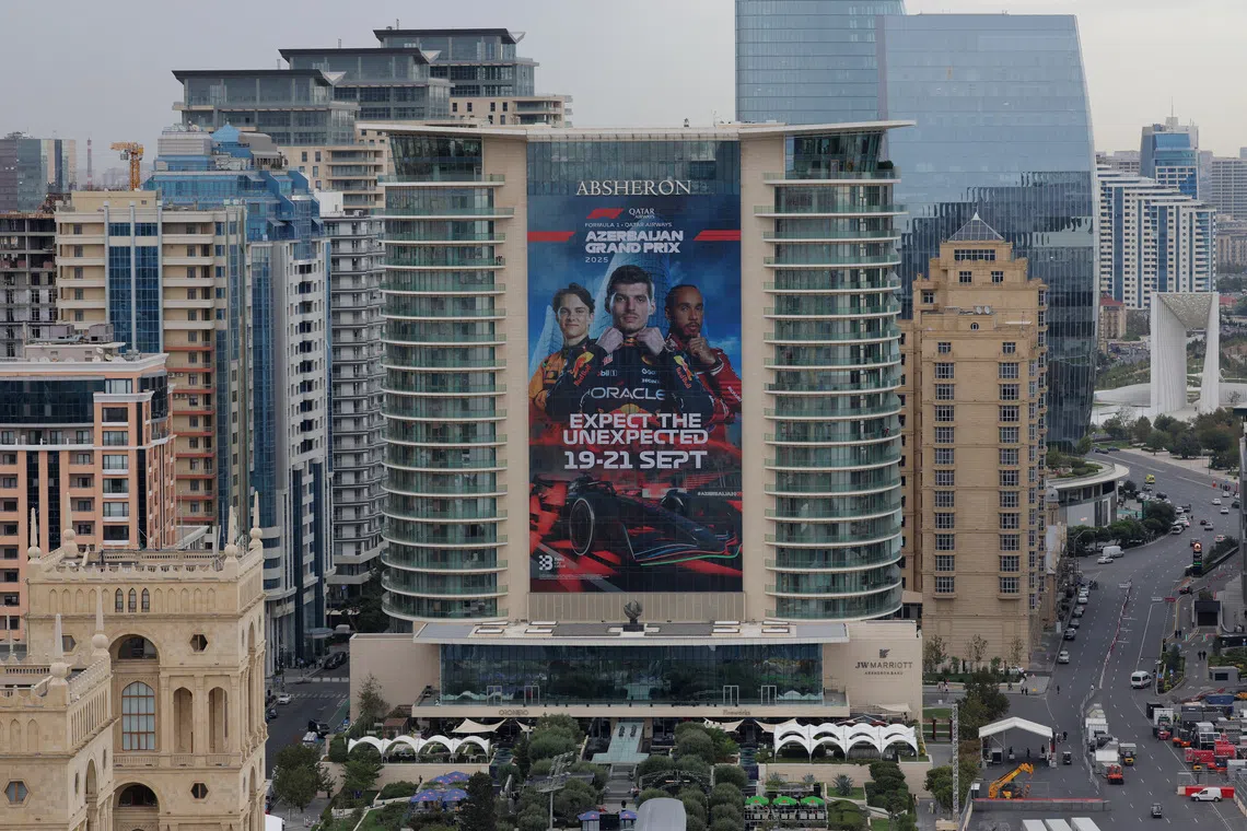 Formula One F1 - Azerbaijan Grand Prix - Baku City Circuit, Baku, Azerbaijan - September 17, 2025 General view of advertising on a building ahead of the Azerbaijan Grand Prix REUTERS/Anton Vaganov