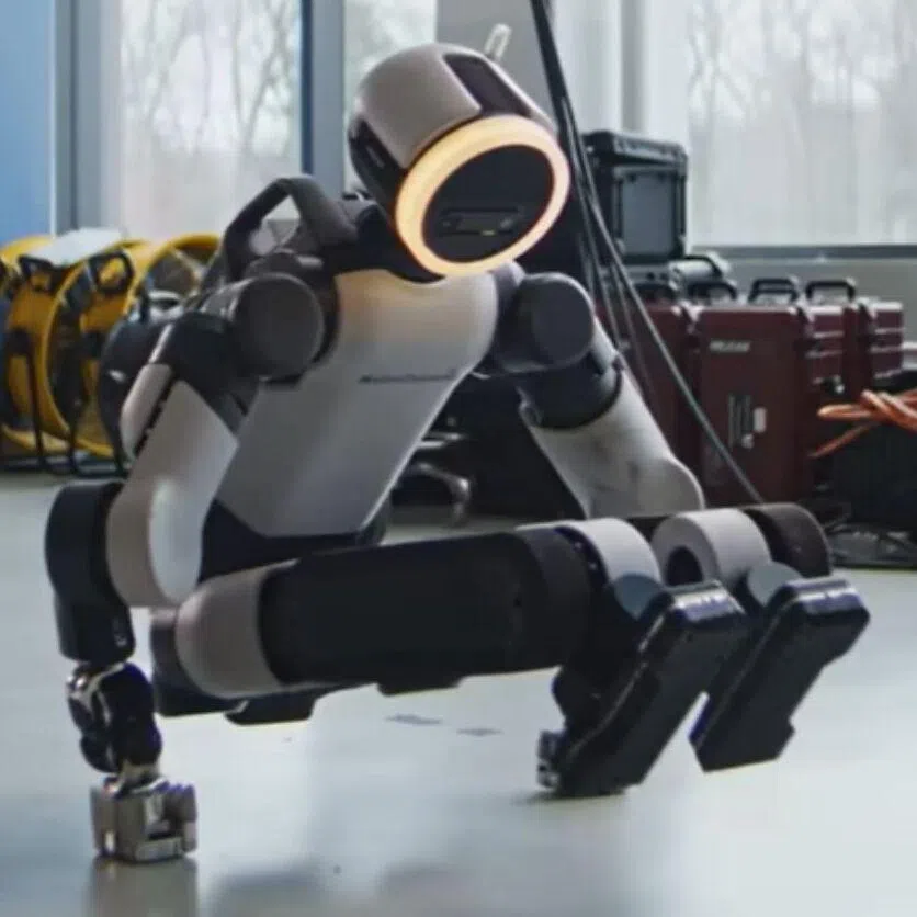 The robot features human-scale hands with tactile sensing and fully rotational joints. 