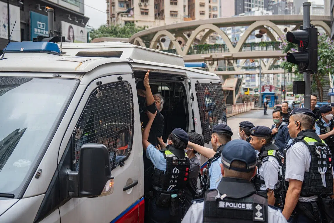 Local media identified the 68-year-old protester as an Alexandra Wong.