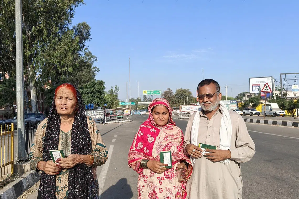 Ms Baskari (centre), an India-born Pakistani national, and her husband and aunt were in India to attend a family wedding on April 26 but had to skip it to return to Pakistan.