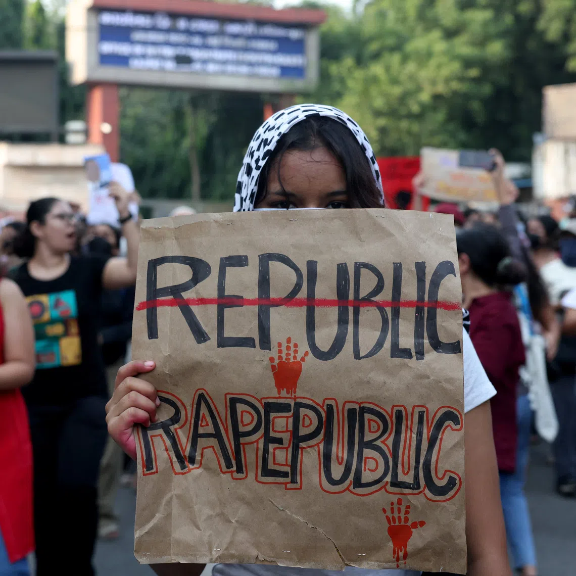 A college student during a solidarity march demanding police action and better safety for women following the alleged gang rape of a girl, in New Delhi, on Sept 23.