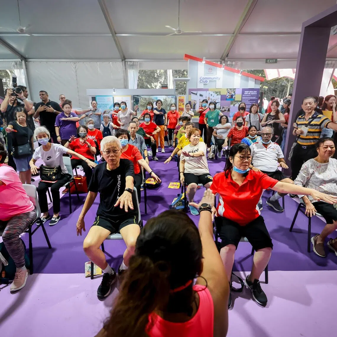 Seniors citizens participate in healthy lifestyle activities and quizzes at the Healthier SG roadshow held at Bishan-Ang Mo Kio Park, July 8, 2023.