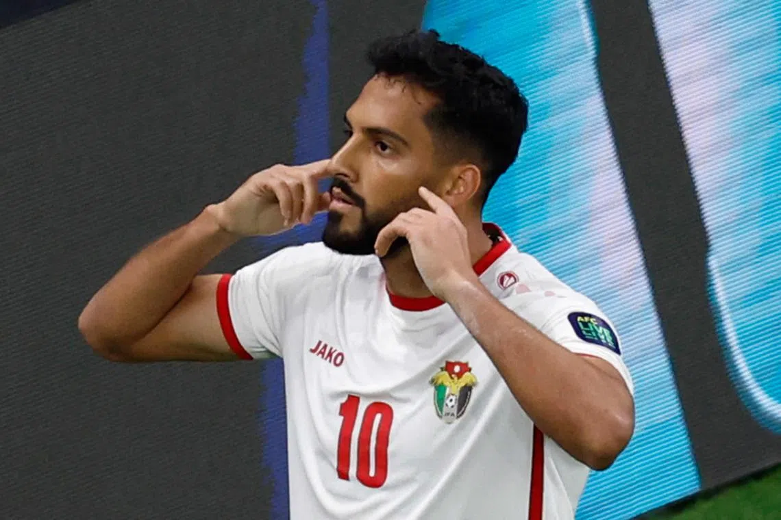 Jordan star Musa Al-Taamari celebrating after scoring his team's second goal during their 2-0 upset win over South Korea in the Asian Cup semi-final football match at the Ahmad Bin Ali Stadium in Al-Rayyan on Feb 6.