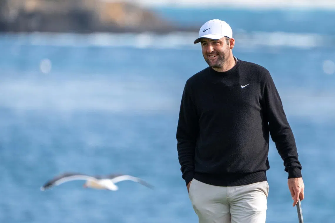 FILE PHOTO: February 2, 2025; Pebble Beach, California, USA; Scottie Scheffler smiles on the 18th hole during the final round of the AT&T Pebble Beach Pro-Am golf tournament at Pebble Beach Golf Links. Mandatory Credit: Kyle Terada-Imagn Images/File Photo