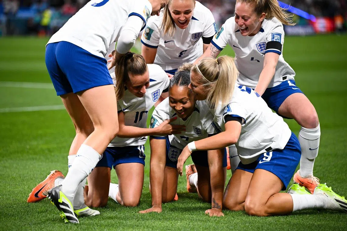 Lauren James of England celebrates with teammates after scoring a goal in the 1-0 win over Denmark.