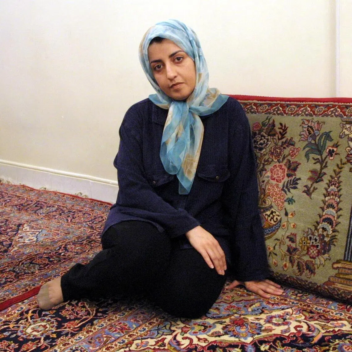 Iranian peace activist Narges Mohammadi at her home in Tehran on September 4, 2001. She is fighting for her life after being hospitalised under guard with a heart condition.