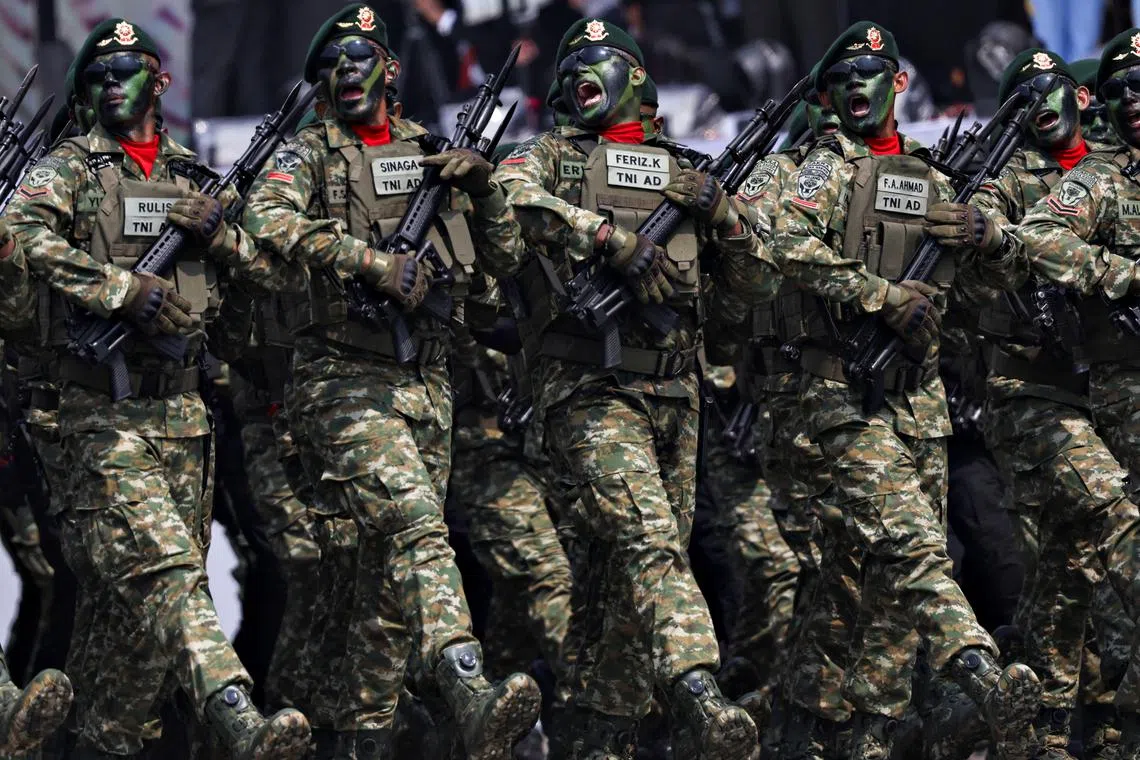 FILE PHOTO: Indonesian Army personnel perform during the 79th Indonesian Military Anniversary celebrations at the National Monument (Monas) complex in Jakarta, Indonesia, October 5, 2024. REUTERS/Ajeng Dinar Ulfiana/File Photo