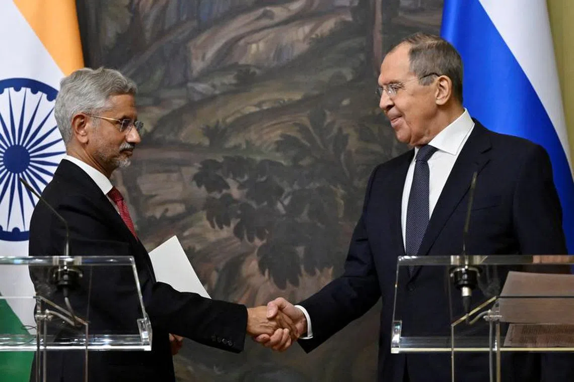 Russia's Foreign Minister Sergei Lavrov shakes hands with India's Foreign Minister Subrahmanyam Jaishankar during a joint press conference following their talks in Moscow, Russia December 27, 2023. Alexander Nemenov/Pool via REUTERS