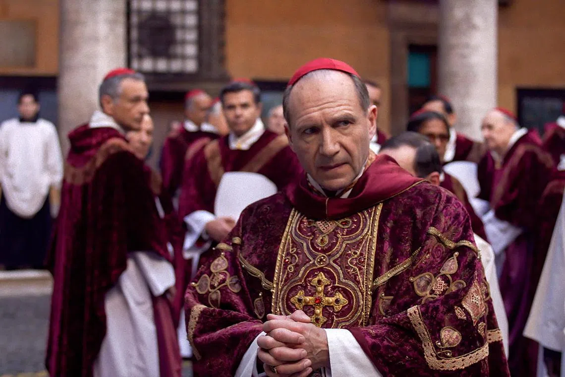 Ralph Fiennes stars as Cardinal Lawrence in Conclave