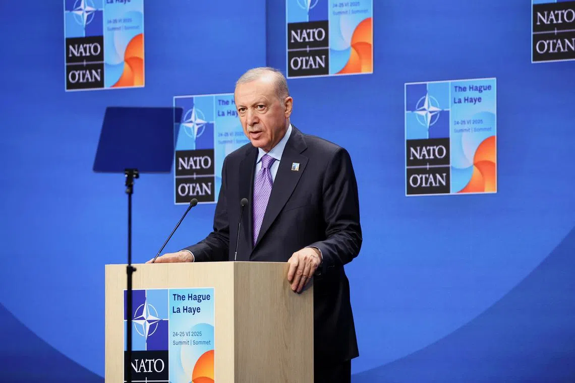 Turkey's President Tayyip Erdogan speaks during a press conference at the NATO summit in The Hague, Netherlands June 25, 2025. REUTERS/Piroschka Van De Wouw