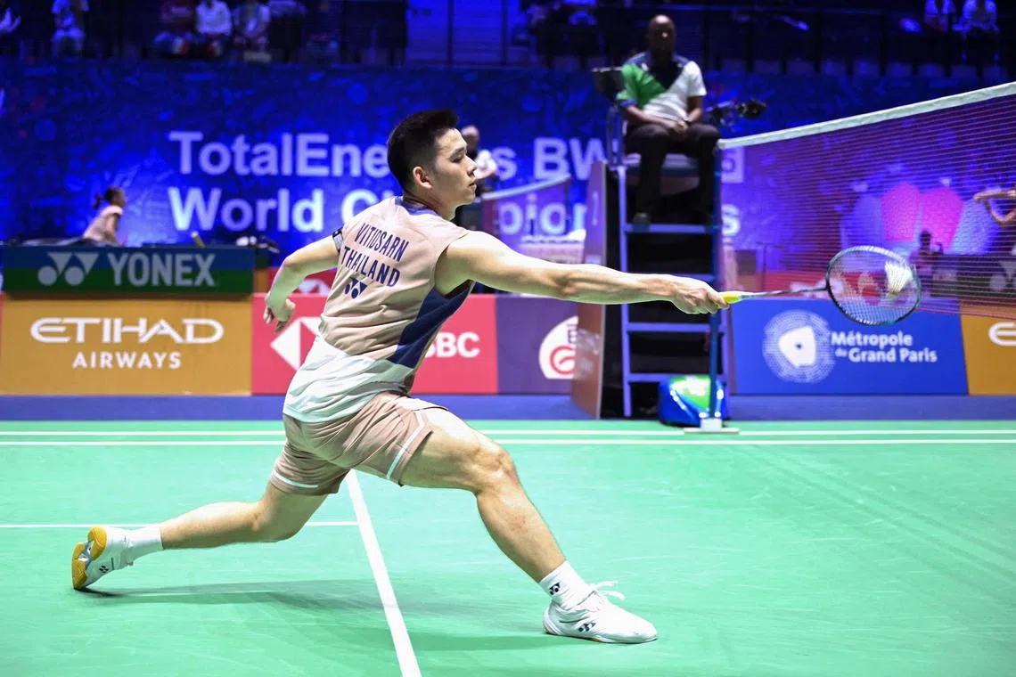 Thailand's Kunlavut Vitidsarn hits a return to El Salvador's Uriel Francisco Canjura Artiga.