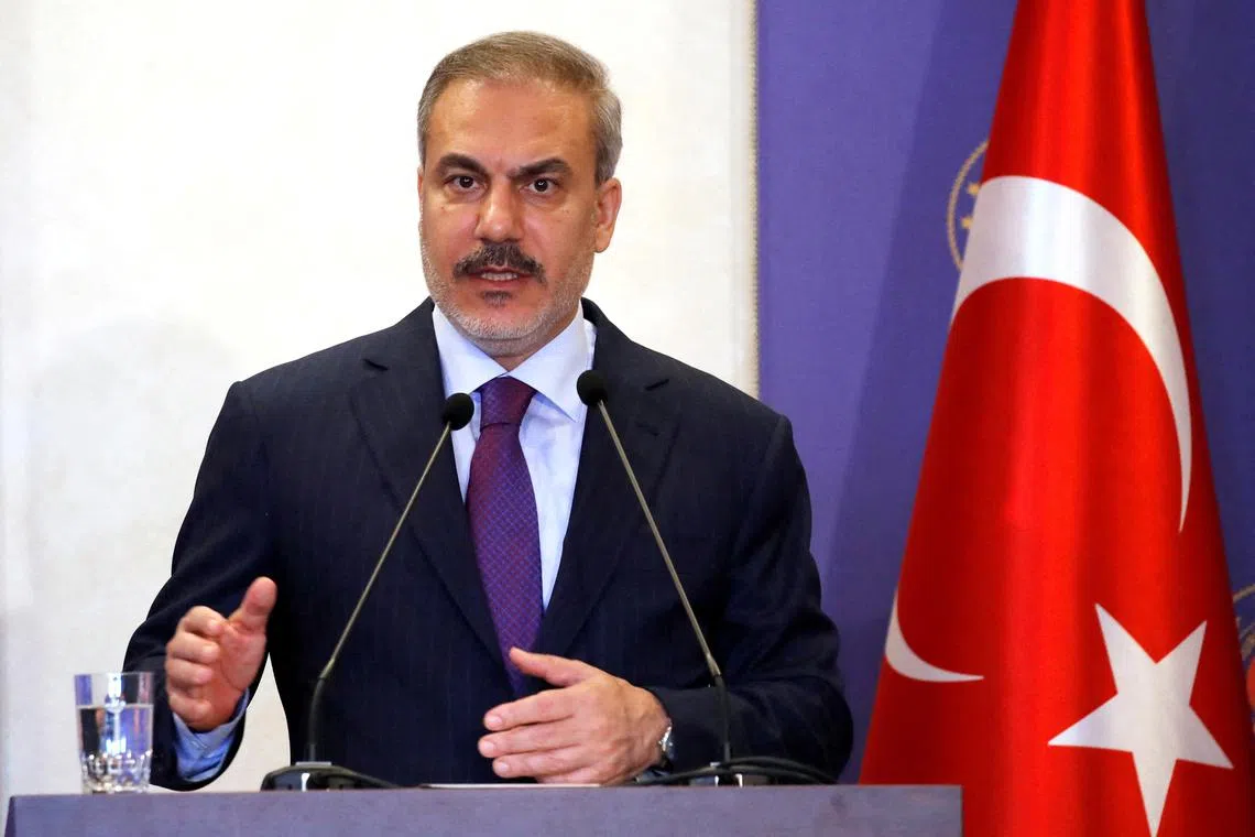 FILE PHOTO: Turkish Foreign Minister Hakan Fidan speaks during a press conference in Istanbul, Turkey, October 19, 2024. REUTERS/Dilara Senkaya/File Photo