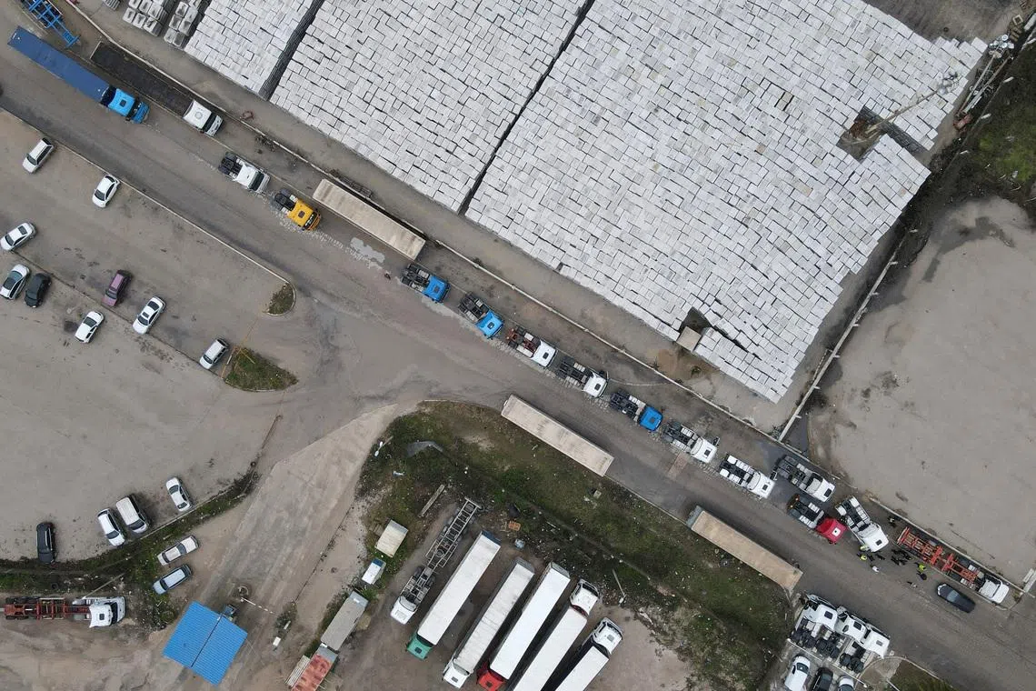 A drone view of truck drivers and transport union representatives protesting in front of the Port of Bar, as part of wider Western Balkans blockades against the EU's new entry–exit rules, with growing concerns over fuel shortages after Montenegro's energy ministry warned supplies were limited to what was available at petrol stations, in Bar, Montenegro, January 29, 2026. REUTERS/Stevo Vasiljevic