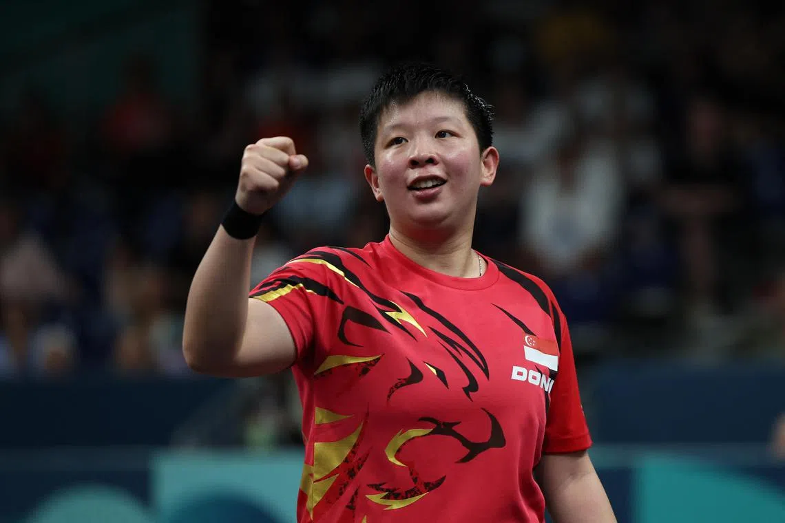 Paris 2024 Olympics - Table Tennis - Women's Singles Round of 64 - South Paris Arena 4, Paris, France - July 28, 2024.
Jian Zeng of Singapore celebrates winning her round of 64 match against Ivana Malobabic of Croatia REUTERS/Paul Childs