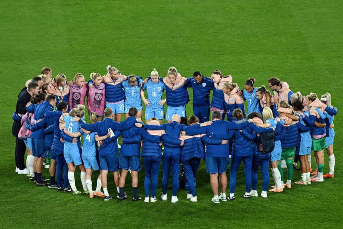 Soccer Football - FIFA Women's World Cup Australia and New Zealand 2023 - Final - Spain v England - Stadium Australia, Sydney, Australia - August 20, 2023 England huddle as they look dejected after losing the World Cup final REUTERS/Jaimi Joy/File photo