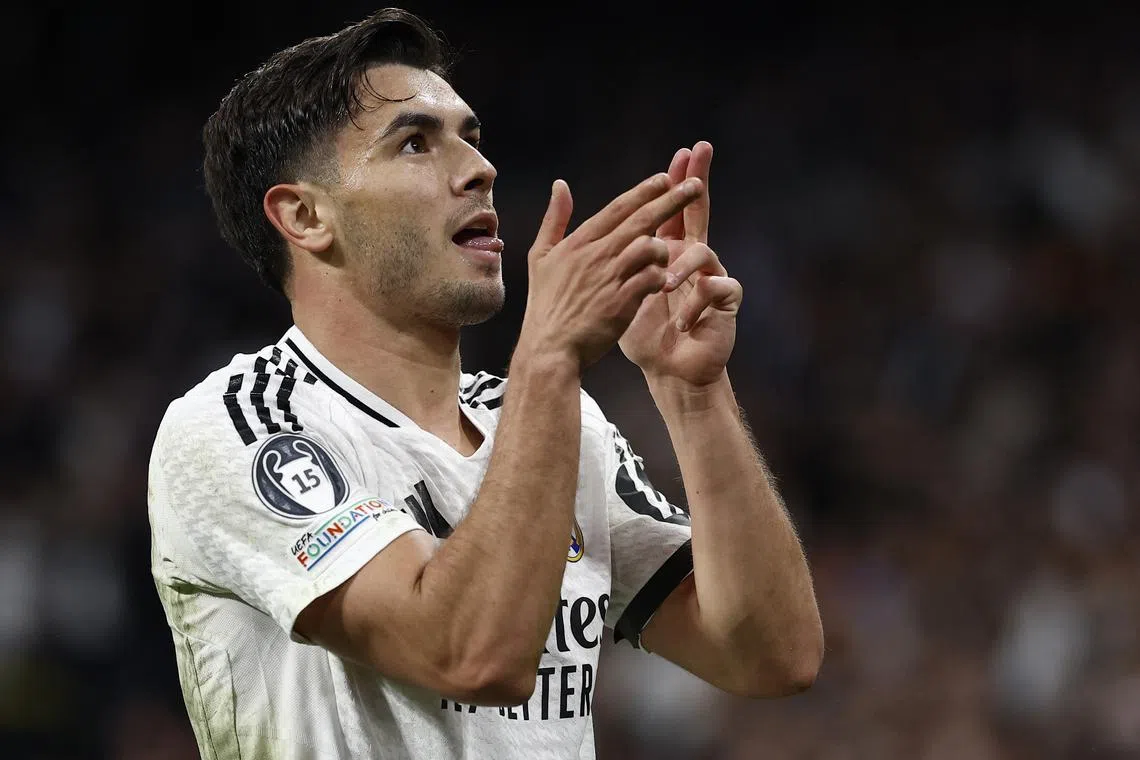 Soccer Football - Champions League - Round of 16 - First Leg - Real Madrid v Atletico Madrid - Santiago Bernabeu, Madrid, Spain - March 4, 2025 Real Madrid's Brahim Diaz celebrates scoring their second goal REUTERS/Juan Medina