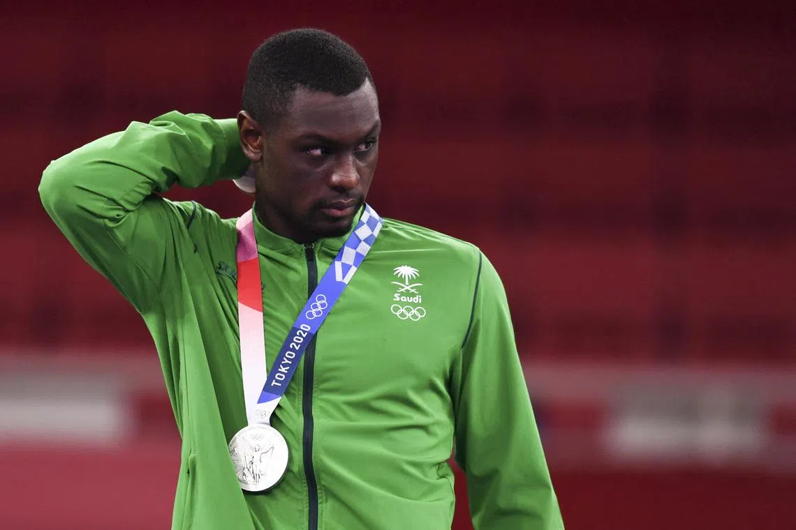 FILE PHOTO: Tokyo 2020 Olympics - Karate - Men's +75kg Kumite - Medal Ceremony - Nippon Budokan, Tokyo, Japan - August 7, 2021. Silver medallist Tareg Hamedi of Saudi Arabia looks on. REUTERS/Annegret Hilse/File Photo