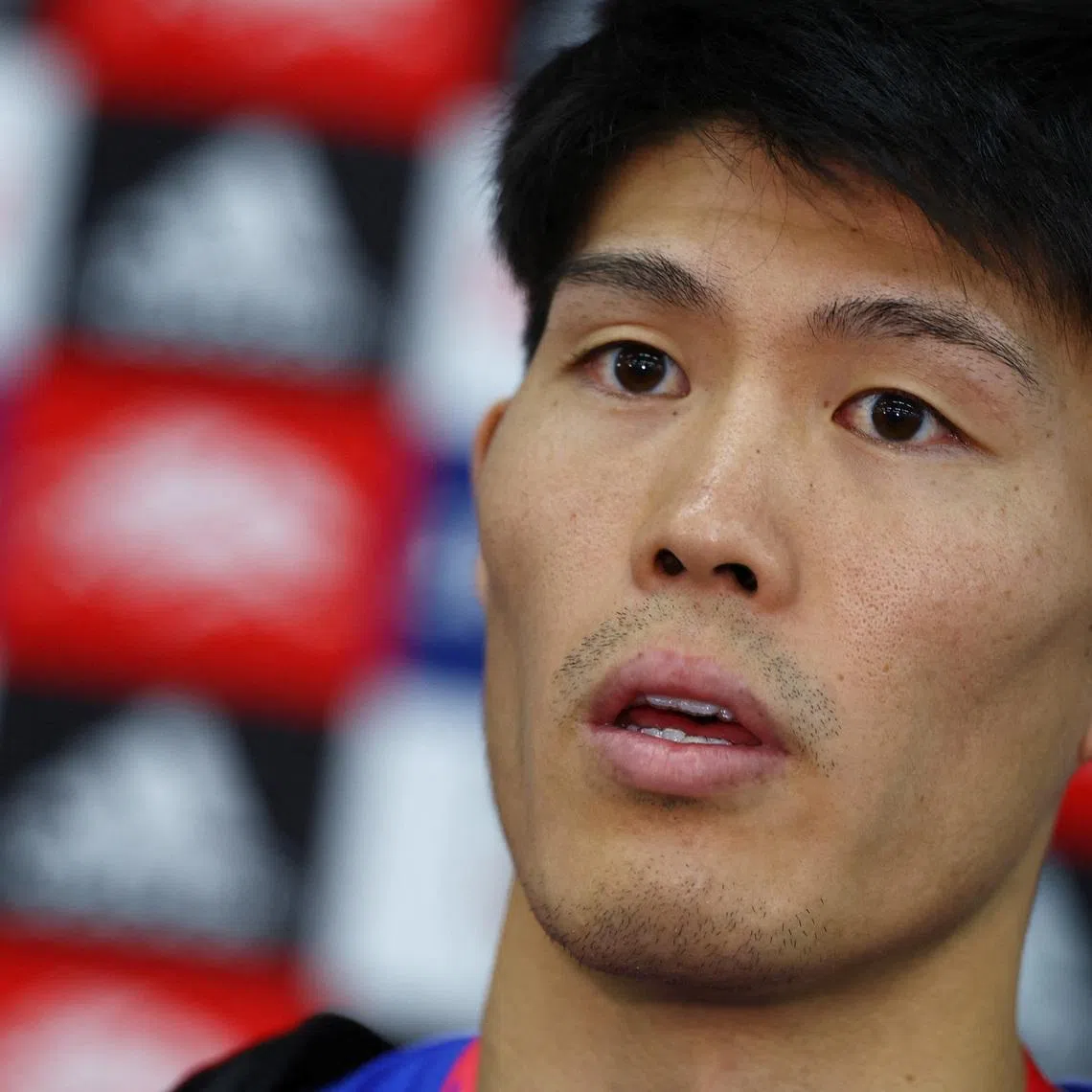 FILE PHOTO: Soccer Football - FIFA World Cup Qatar 2022 - Japan Training - Al Sadd SC New Training Facilities 1, Doha, Qatar - November 26, 2022 Japan's Takehiro Tomiyasu speaks to the media after training REUTERS/Bernadett Szabo/File Photo