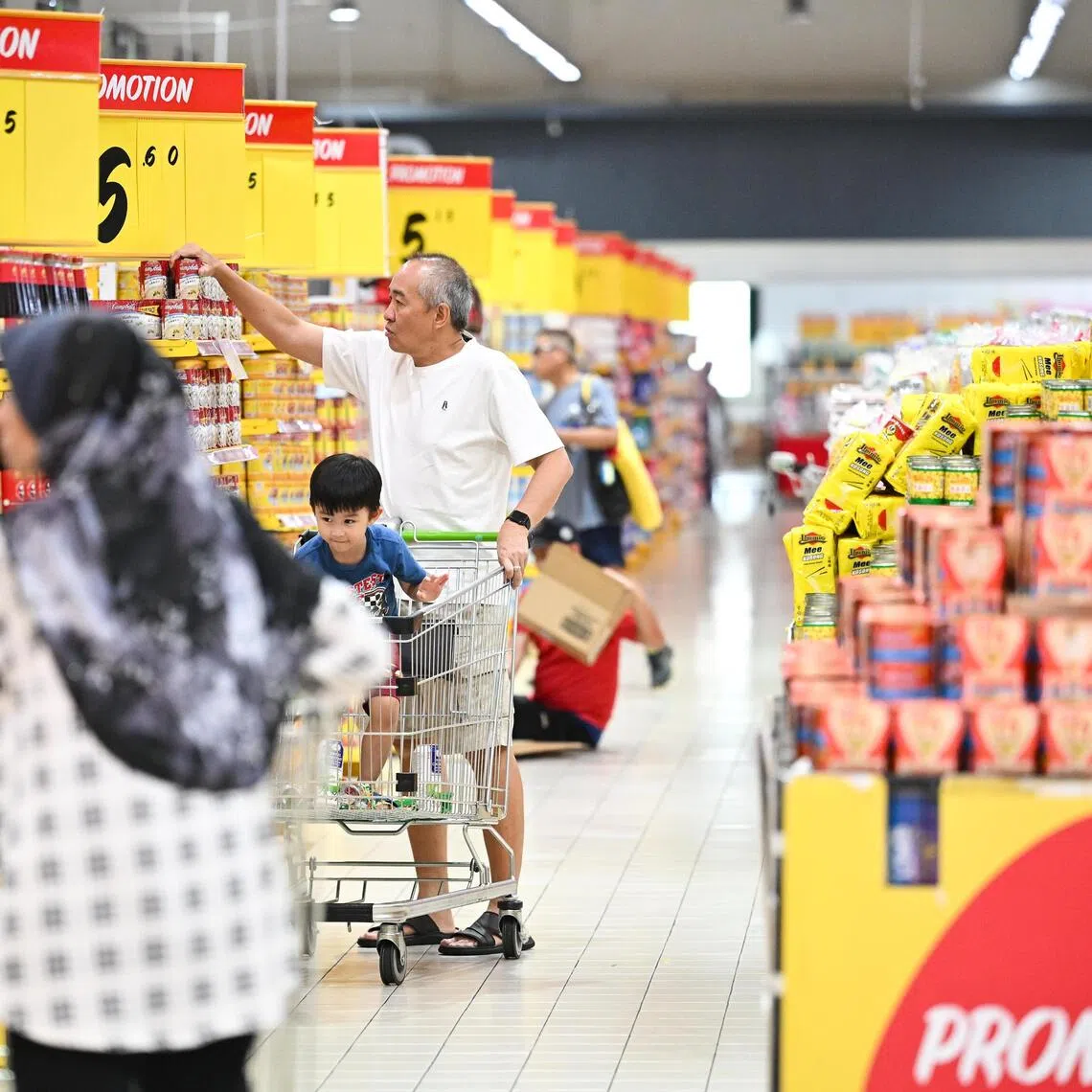 Shoppers at a hypermarket in Tampines. A growing body of research points to a troubling possibility that highly processed food and beverages are contributing to childhood allergies, says the writer.