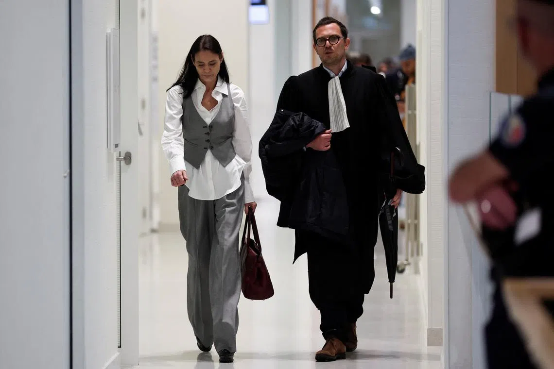British actress Charlotte Lewis and her lawyer Benjamin Chouai arrive for the verdict of her defamation case against filmmaker Roman Polanski, at the courthouse in Paris, France, May 14, 2024. REUTERS/Gonzalo Fuentes