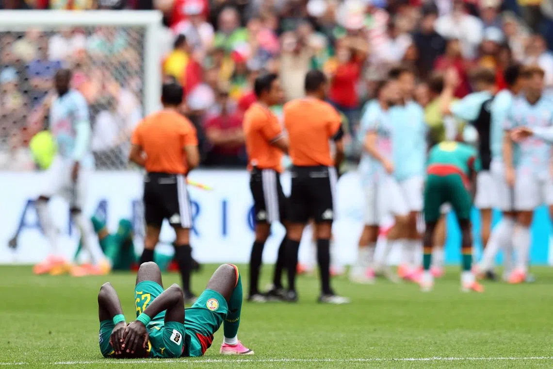 Soccer Football - FIFA World Cup 2026 - Round of 32 - Belgium v Senegal - Seattle Stadium, Seattle, Washington, U.S. - July 1, 2026  Senegal's El Hadji Malick Diouf looks dejected after the match as Senegal are eliminated from the World Cup IMAGN IMAGES via Reuters/Blake Dahlin