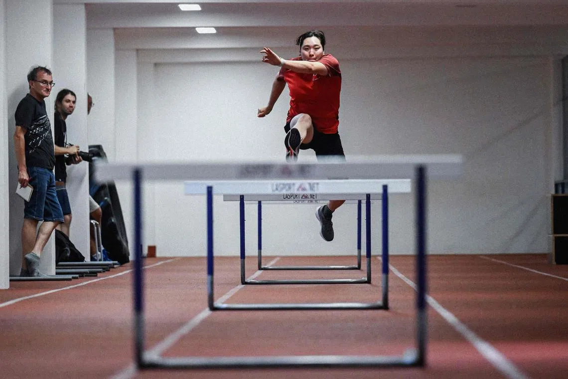 Reigning Olympic and world javelin champion Haruka Kitaguchi jumps over hurdles during a training session in the Athletics tunnel in Domazlice, Czech Republic.