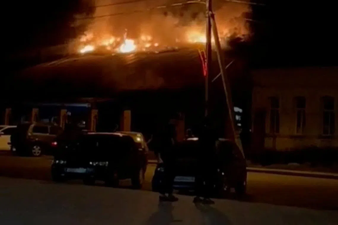 A view of a fire at Korenevsky Plant low-voltage equipment, amid Russia's attack on Ukraine, in Korenevo, Kursk, Russia in this screen grab obtained from social media video released July 16, 2024