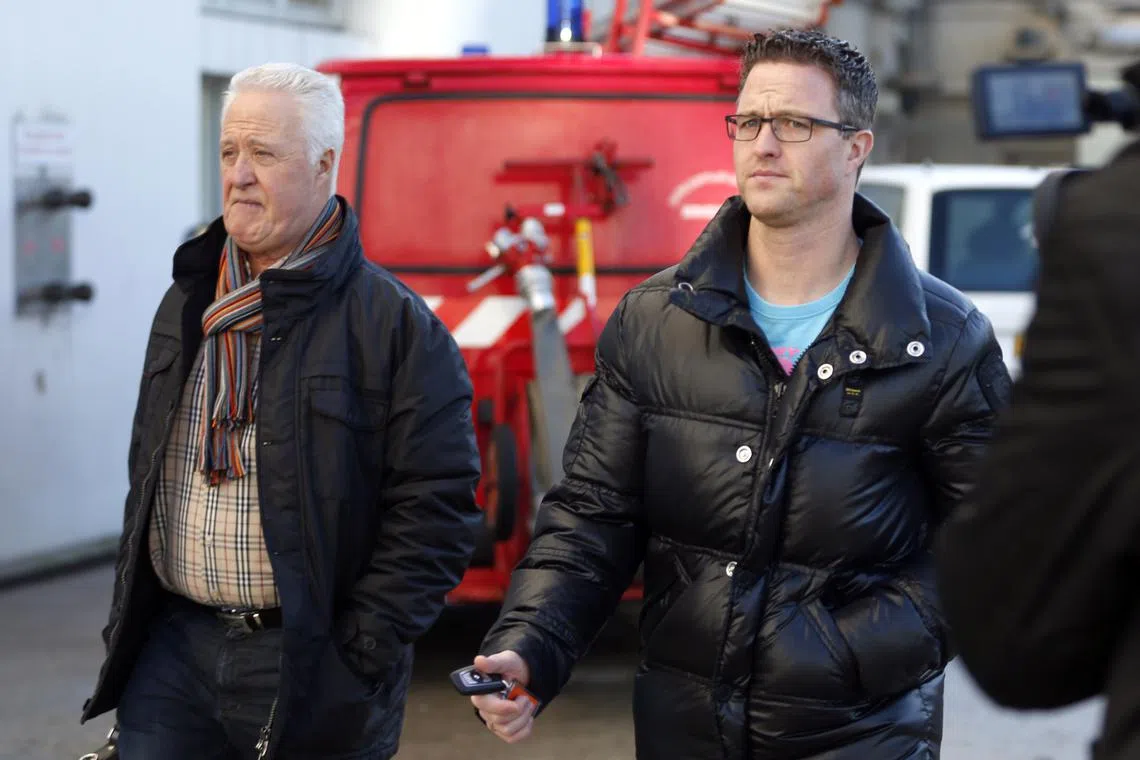 Rolf (L) and Ralf Schumacher (R), the father and brother of former Formula One world champion Michael Schumacher respectively, arrive at the CHU hospital emergency unit in Grenoble, French Alps, where Michael is hospitalised, January 5, 2014. REUTERS/Charles Platiau/ File Photo