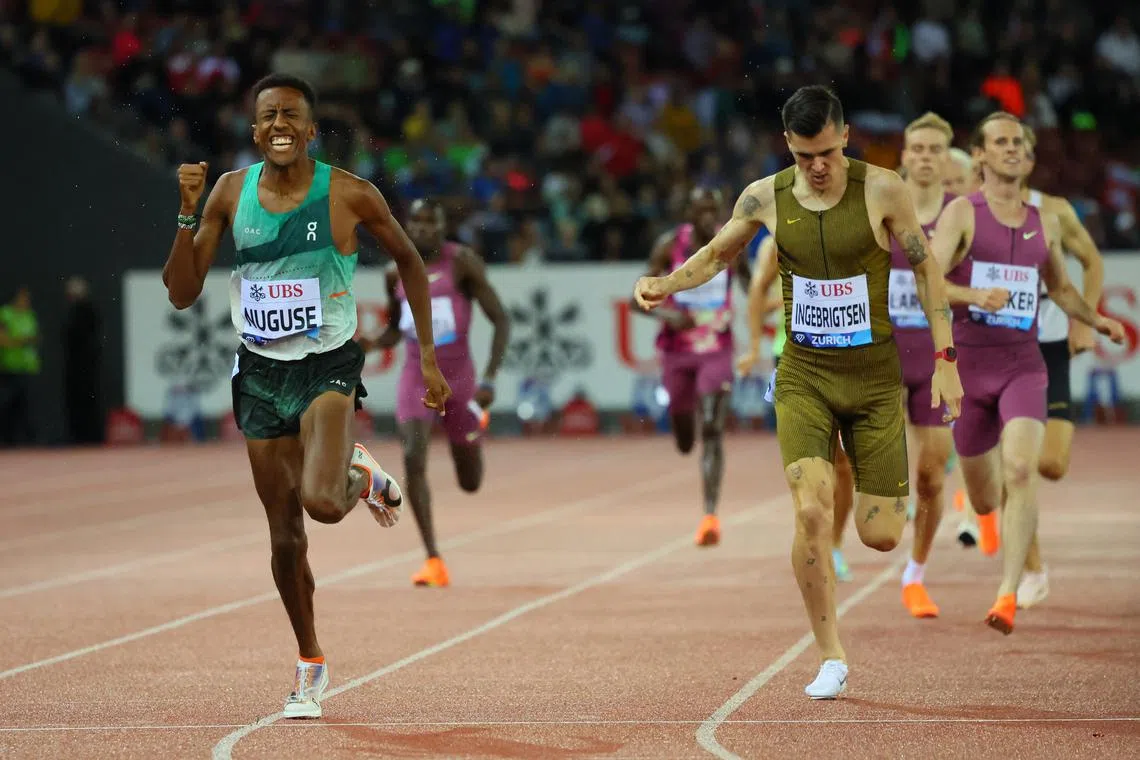 Athletics - Diamond League - Zurich - Stadion Letzigrund, Zurich, Switzerland - September 5, 2024 United States' Yared Nuguse and Norway's Jacob Ingebrigtsen in action, as Nuguse wins the men 1500m REUTERS/Denis Balibouse