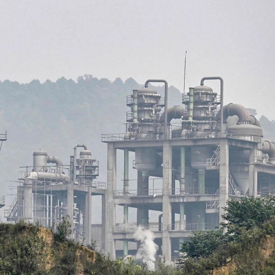 Smoke and dust from the Duc Giang Lao Cai chemical plant in the Tang Loong industrial park.