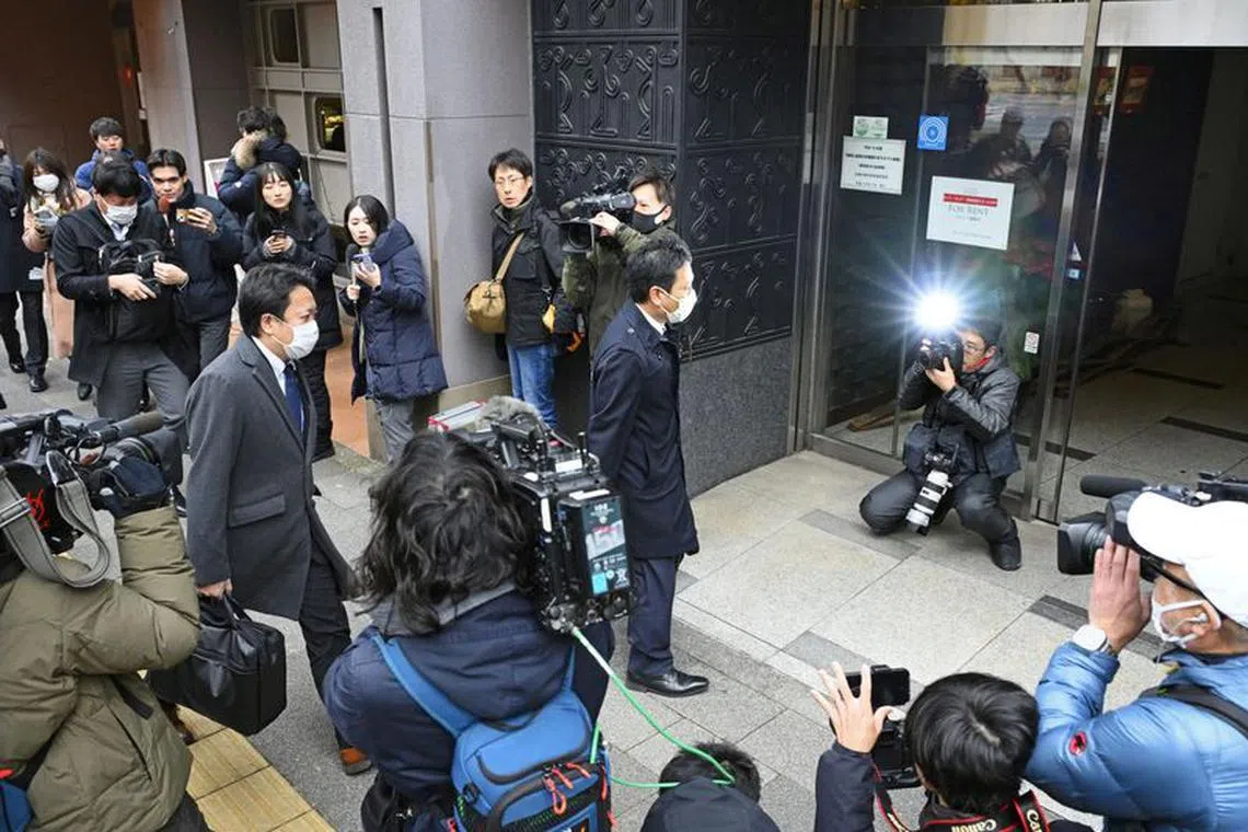 Investigative team members from the Tokyo District Public Prosecutors Office arrive for a search at a building where the headquarters of a powerful political faction within the ruling Liberal Democratic Party (LDP) is located, in Tokyo, Japan December 19, 2023. Mandatory credit Kyodo/via REUTERS