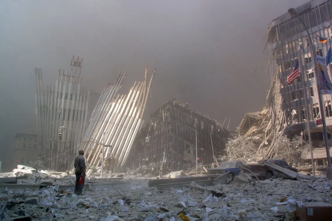 A man asking if anyone needs help after the collapse of the first World Trade Center tower in New York on Sept 11, 2001.