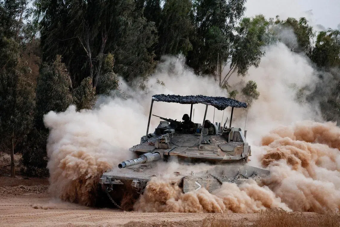 An Israeli tank returning from Gaza on July 4.