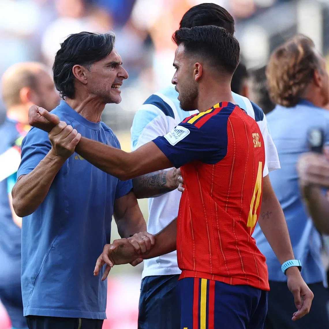 Soccer Football - FIFA World Cup 2026 - Final - Spain v Argentina - New York/New Jersey Stadium, East Rutherford, New Jersey, U.S. - July 19, 2026 Spain's Eric Garcia clashes with Argentina assistant coach Roberto Ayala at the end of the match REUTERS/Hannah Mckay