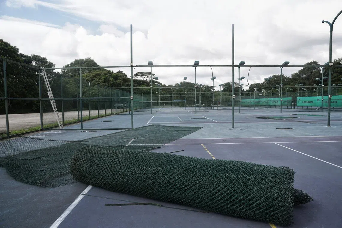 The tennis courts, some of which have had their nets and fences taken down, at The Cage Sports Park on Dec 21.
