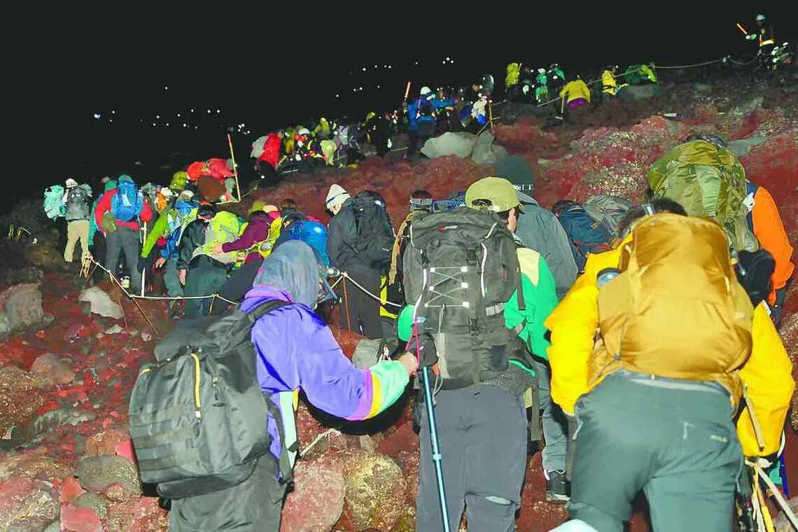 Mount Fuji sunrise rush still causes dangerous crowding near summit despite new climbing rules