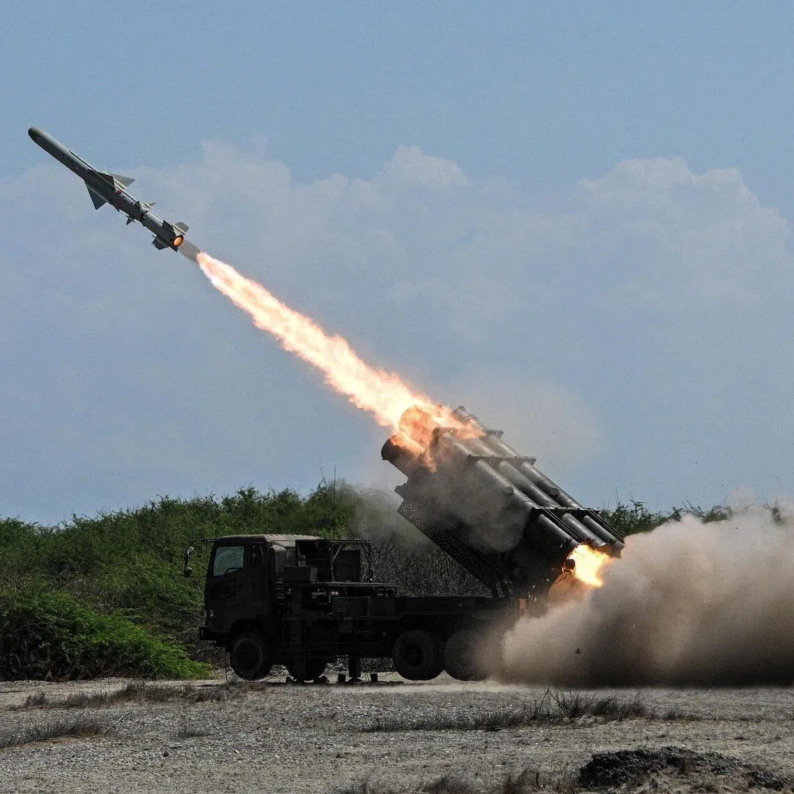 A Japan Ground Self-Defense Force (JGSDF) Type 88 surface-to-ship missile launcher fires during the Joint Task Force (JTF) Maritime Strike, part of the Balikatan joint military exercises between the United States and the Philippines in Ilocos Norte province.