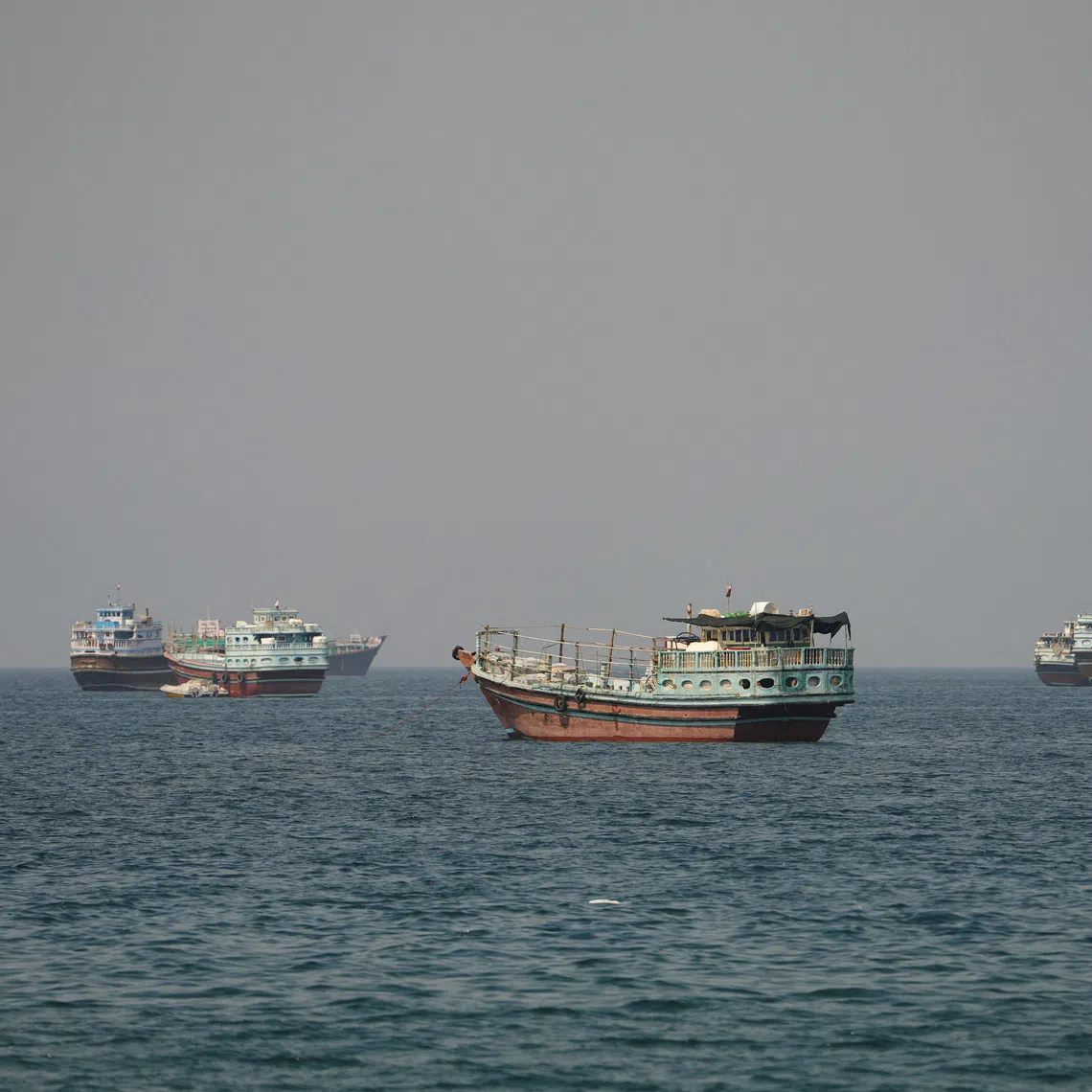 FILE PHOTO: Vessels at the Strait of Hormuz, as seen from Musandam, Oman, September 6, 2026. REUTERS/Stringer/File Photo